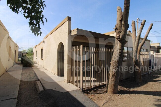 Building Photo - 6742 W Palmaire Ave