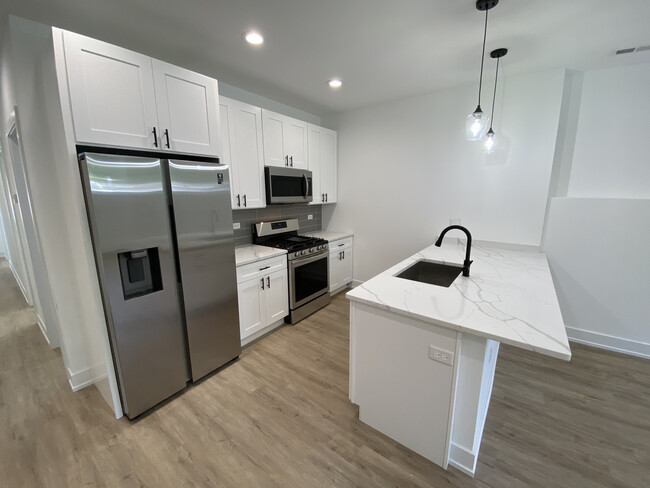 Foto del edificio - 4047 S Prairie Ave