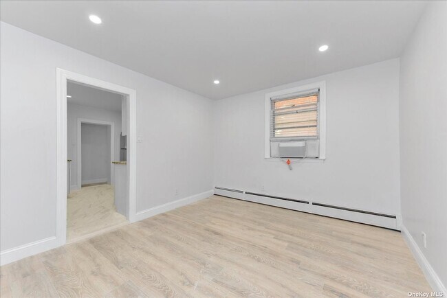 Building Photo - 129-14 135th Ave