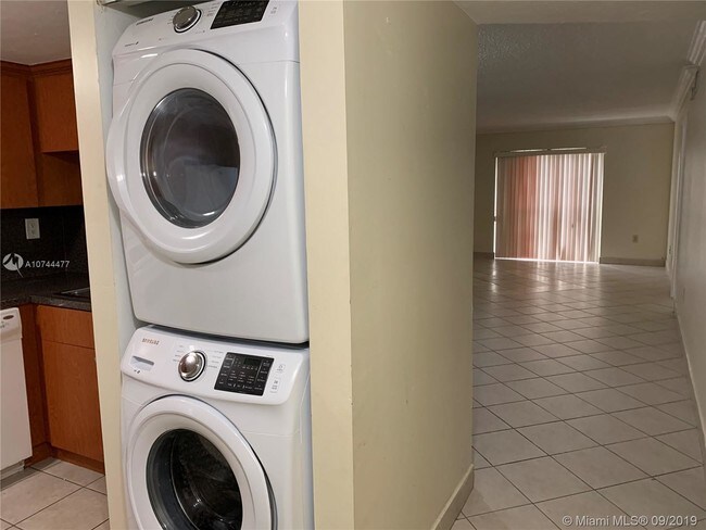 Building Photo - 9911 W Okeechobee Rd