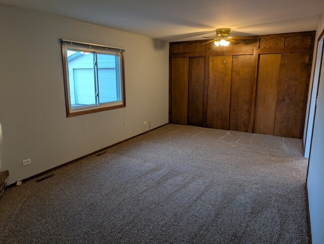 Family room with built in storage - 18531 W Judy Dr