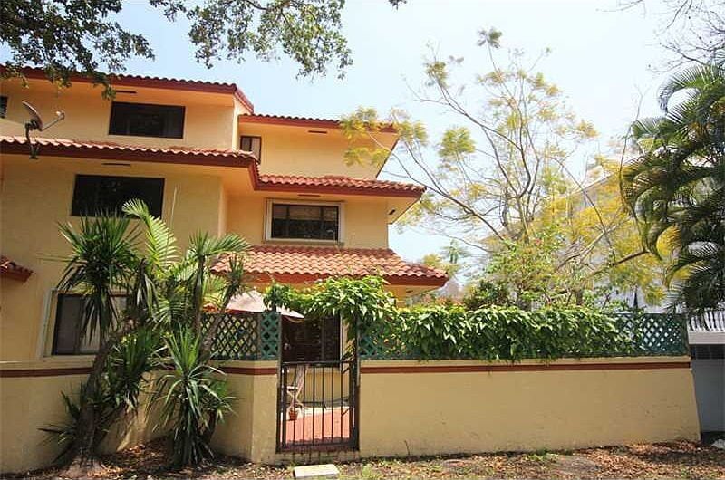 Photo - "Charming 2-Bed Oasis with Hardwood Floors at 5750 Turin St, Coral Gables!"