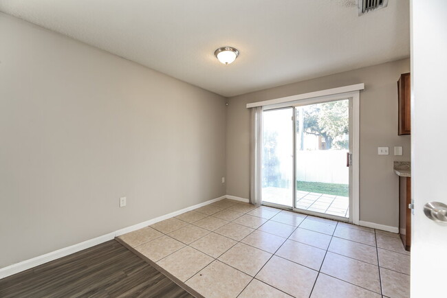 Building Photo - 7899 Cherry Blossom Dr N