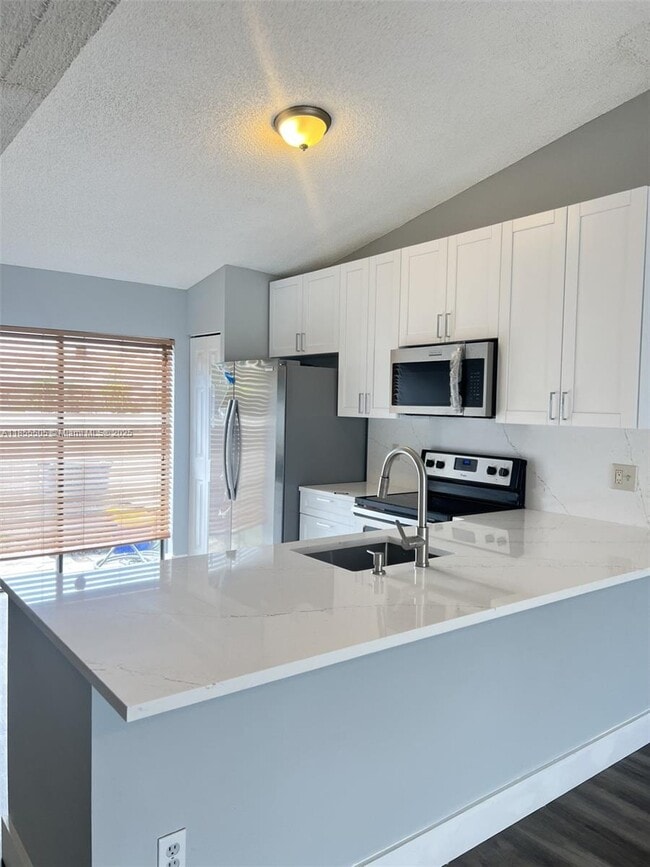 Building Photo - 10155 Boca Bend E
