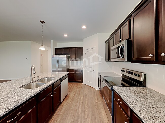 Foto del edificio - 12030 Riley Nicholes Wy