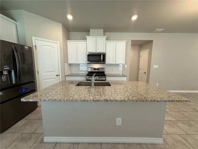 Foto del edificio - 7637 Bullrider Dr