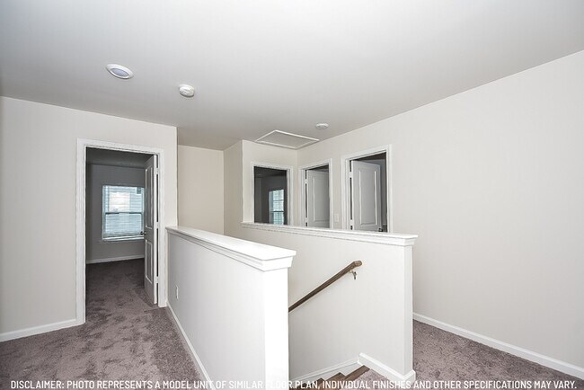 Building Photo - Brand New in Spring Meadow!