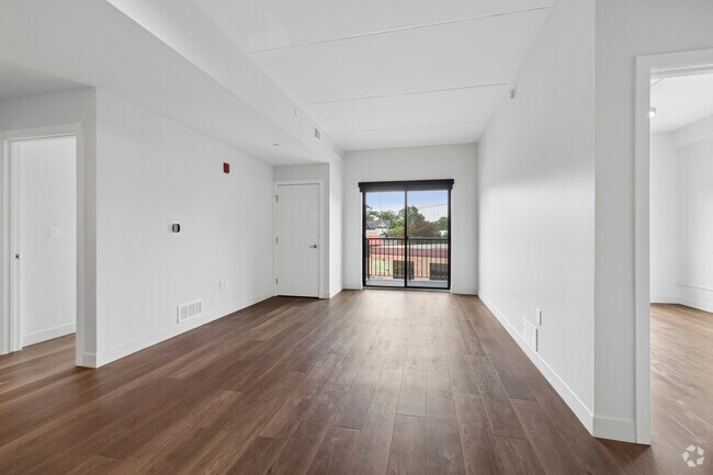 2 habitaciones, 2 baños - 830 pies cuadrados - Sala de estar - Lofts on Grove