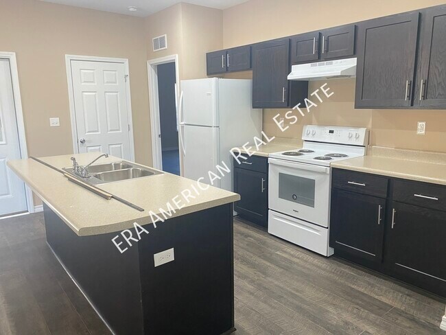 Foto del edificio - 708 Robinson Ave E