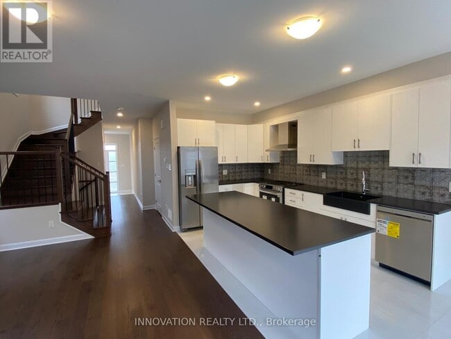 Photo du bâtiment - 213 Invention Blvd