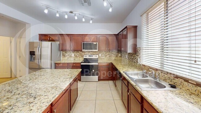 Building Photo - 9218 W Meadow Dr