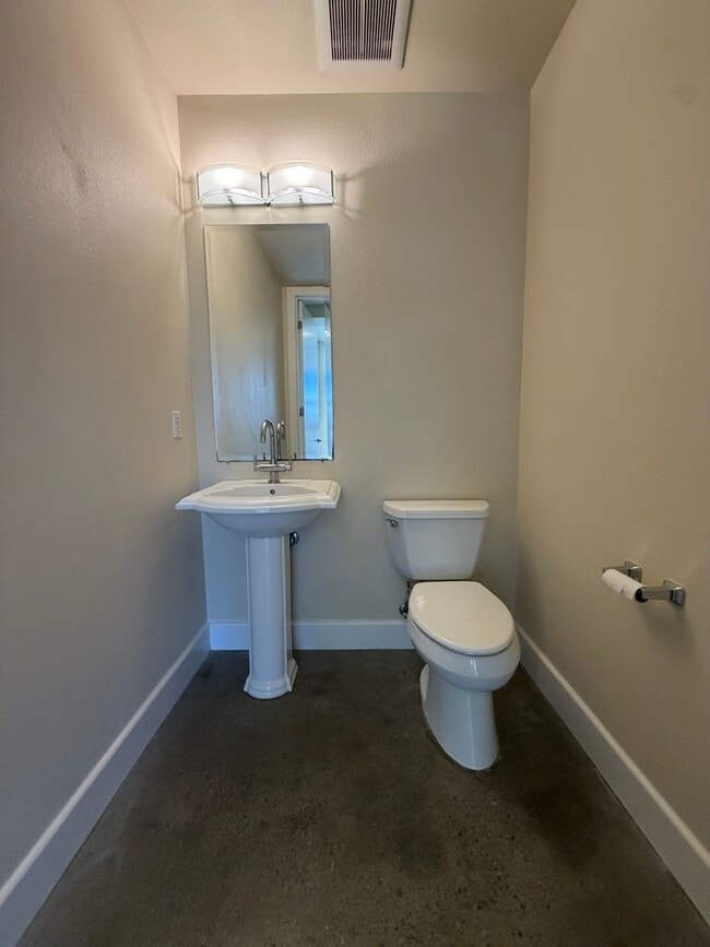 Building Photo - 7034-7046 Santero Way Lofts