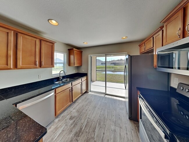 Building Photo - 10113 36th Ct E