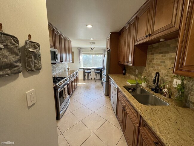 Building Photo - 4 br, 2 bath House - 8301 Blue Lake Dr