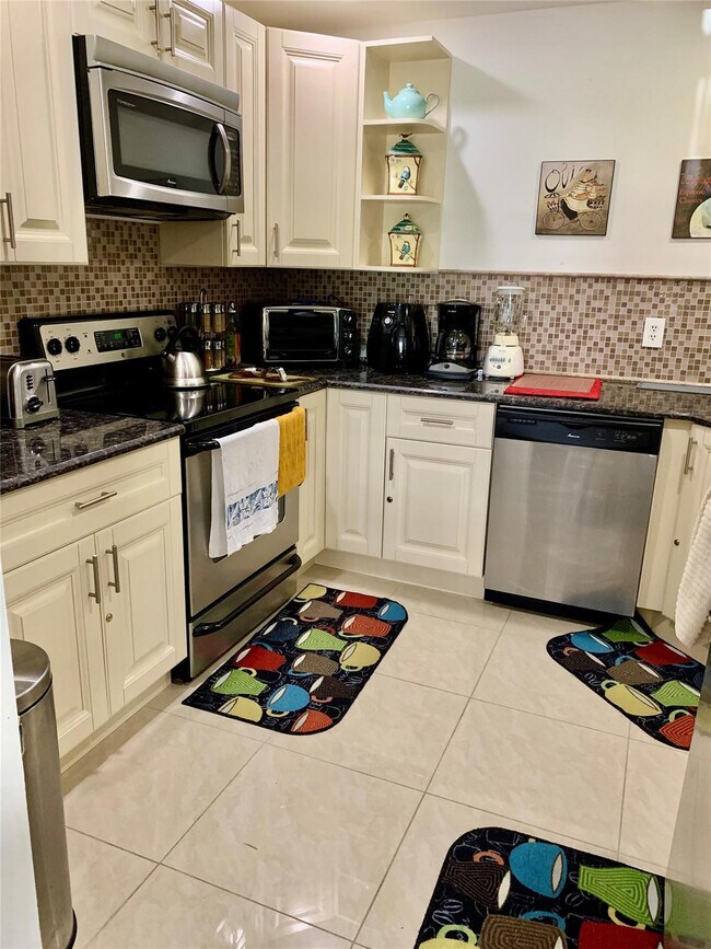 Building Photo - 8657 Boca Glades Blvd