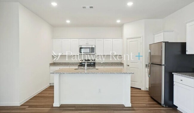 Building Photo - 209 Wild Daisy Wy