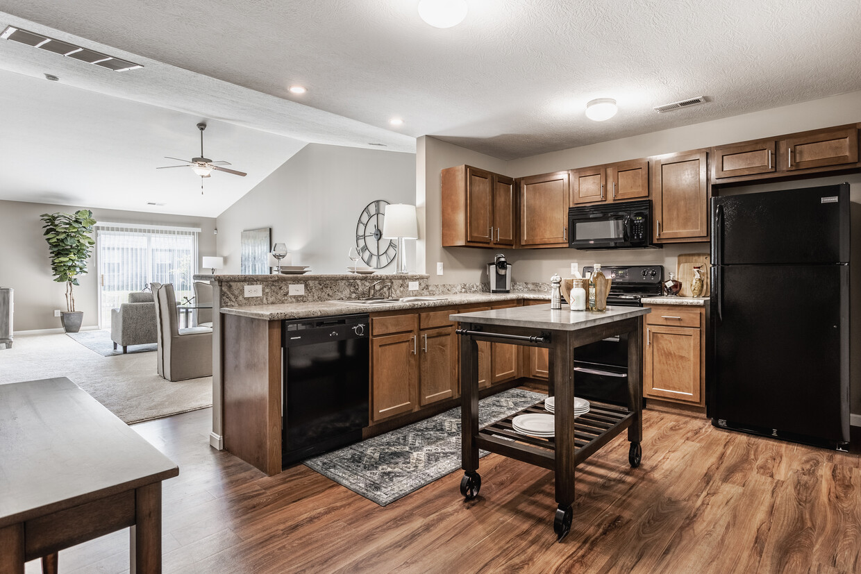 Spacious Kitchen with Granite Countertops - Bedford Place Apartments