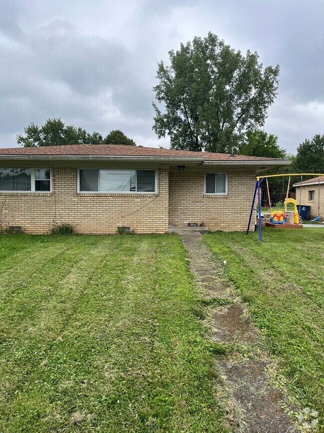 Building Photo - 7014-7016 Manor Dr S