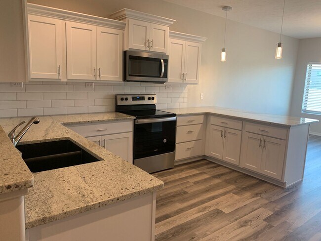 Foto del edificio - Brand New 2 Bedroom Townhome