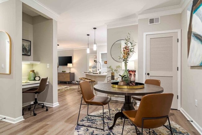 Separate dining room with work station. - Waterstone at Big Creek Apartments