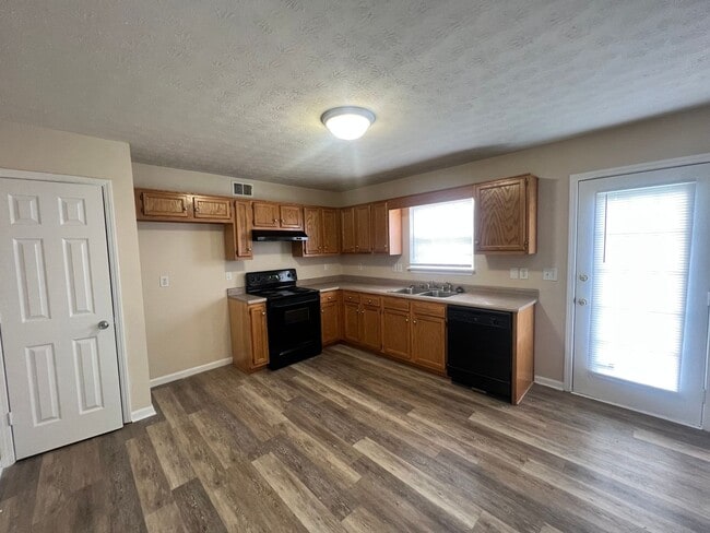 Building Photo - Cooper Farms! Okolona