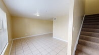 This Houston, TX property offers a spacious 1140 square feet of living area spread across two floors. The home boasts 3 bedrooms, including a generous 180 square foot primary bedroom, and 4 bathrooms, providing ample space for comfortable living. The interior is characterized by a consistent neutral color scheme, with pale yellow walls complemented by white trim and doors.

Throughout the home, durable tile flooring is a prominent feature, offering both aesthetic appeal and easy maintenance. The living areas are bright and open, with recessed lighting and large windows allowing natural light to flood the spaces. The kitchen, while compact, appears functional with white cabinetry and countertops.

The bathrooms are simple yet practical, featuring standard white fixtures and tile flooring. Multiple closets and hallways contribute to the home's overall functionality. The property's layout includes a living room, kitchen, two staircases, and two hallways, facilitating easy movement between spaces.

With 560 square feet on the ground floor and 580 square feet on the upper level, the home provides a balanced distribution of living space. While the interior appears to be in good condition, some areas may benefit from updates or personalization to enhance the overall appeal of this functional family home.