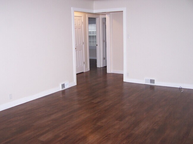 Living room looking into the hall - 107 N Beard St