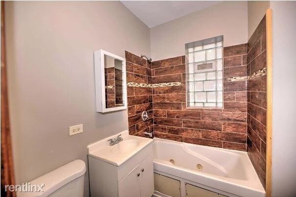 Building Photo - 4 br, 2 bath Apartment - 6237 S Rhodes Ave
