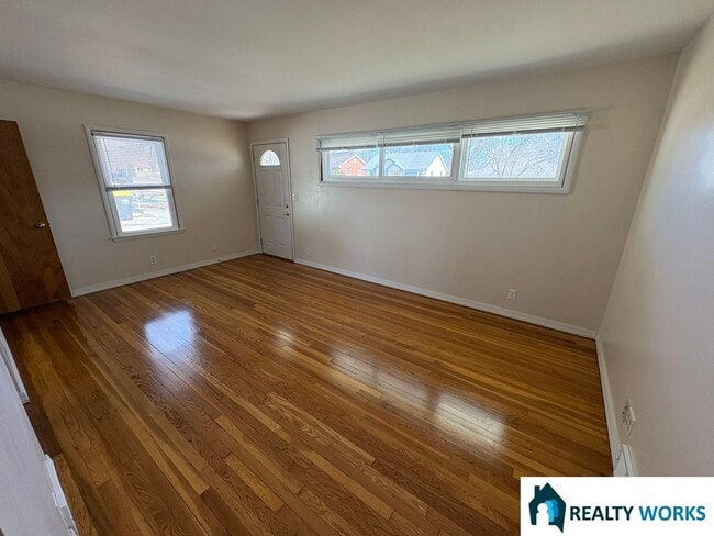 Building Photo - 2-Bedroom Home with Hardwood Floors