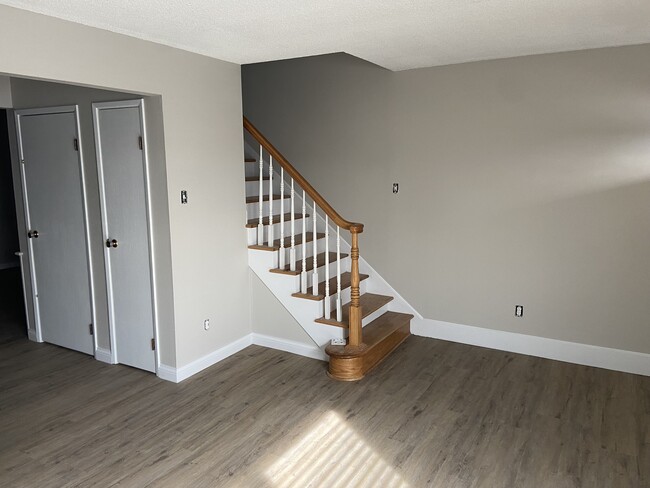 Living Room/Staircase - 13391 Hiddendale Ln