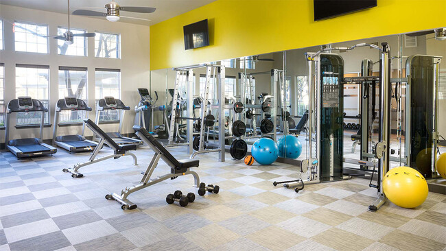 Apartment community 24-hour fitness center at Griffis SoCo Austin in Austin, Texas. - Griffis SoCo Austin