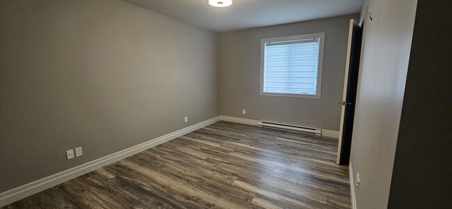 Photo du bâtiment - 1 rue Honor-Roy Rue