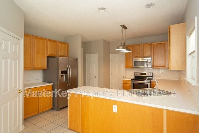 Building Photo - 7916 Strawberry Meadows St