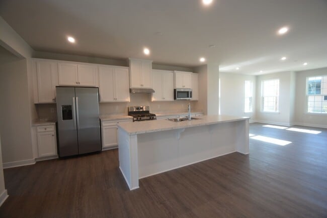 Building Photo - Beautiful and Brand New 4 Bedroom End Unit...