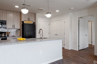 Building Photo - 1200 W Koenig Ln