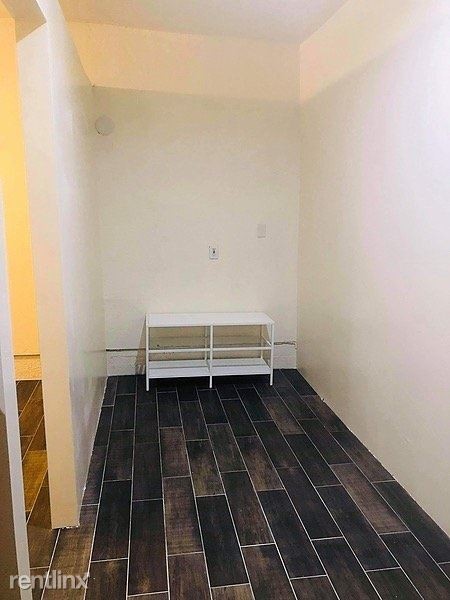 Building Photo - 1 br, 1 bath Apartment - 301 East 3rd Street