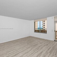 Building Photo - 10185 Collins Ave