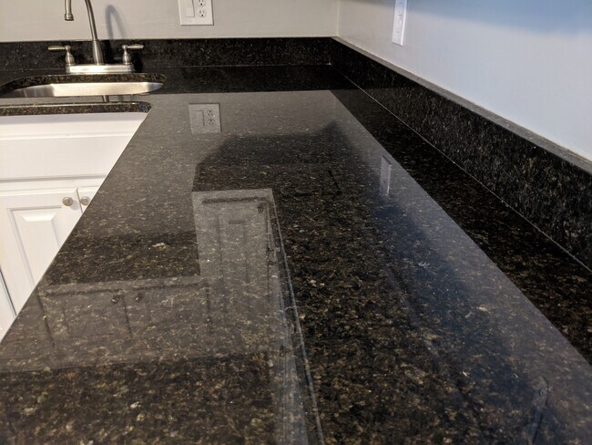 Shiny new granite countertop - 3 Kenmar Dr