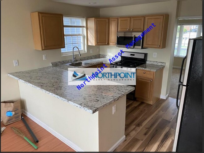 Foto del edificio - Spacious Updated 3BR 3BA Townhome w/ New Deck & Fenced Yard in Elkridge