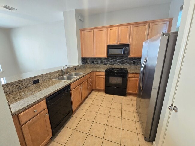 Building Photo - Come experience Uptown living at this resi...