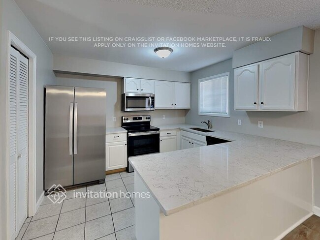 Foto del edificio - 1425 E 97th Pl