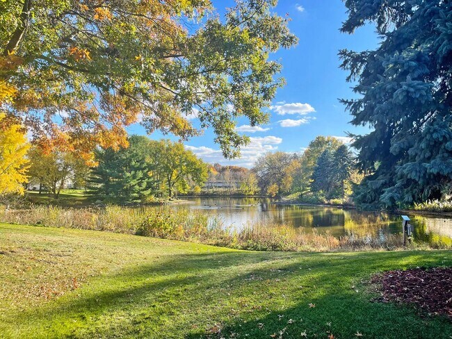Building Photo - Luxury Maintenance-Free **One-Level Living** on Pond, Fireplace, Great Room, Primary Suite, Offic...