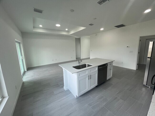 Foto del edificio - MODERN BRAND NEW 4BD/2BA RETREAT IN LEHIGH ACRES!