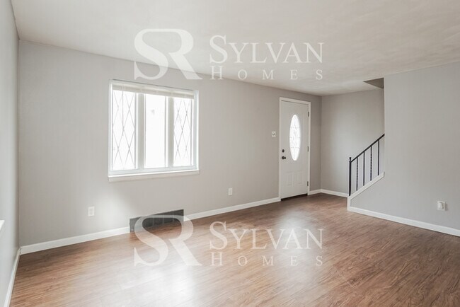 Foto del edificio - Charming brick 3-bedroom, 1-bath home feat...