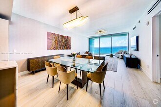 Building Photo - 10203 Collins Ave