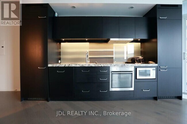 Building Photo - 45 Charles St E