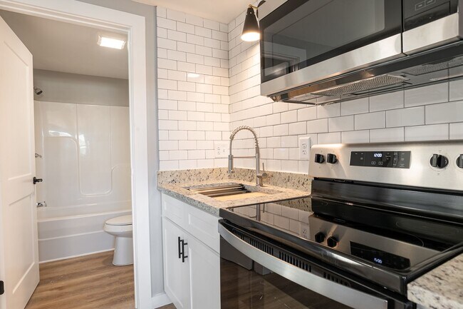 Foto del edificio - Discover Modern Living at Genesis Apartmen...
