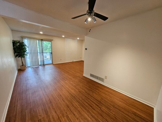 Dining area open to 11' X 19' Living Room & access to deck. Recessed lighting for bright atmosphere. - 2353 Mailand Ct E