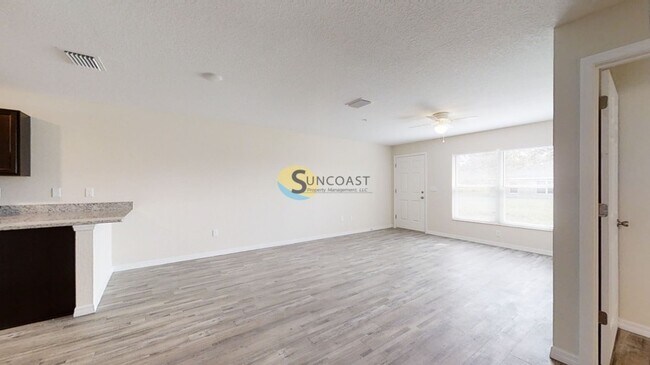 Foto del edificio - 9264 N Travis Dr
