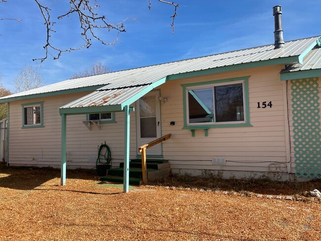 Building Photo - Three Bedroom Bayfield House with Large Fe...